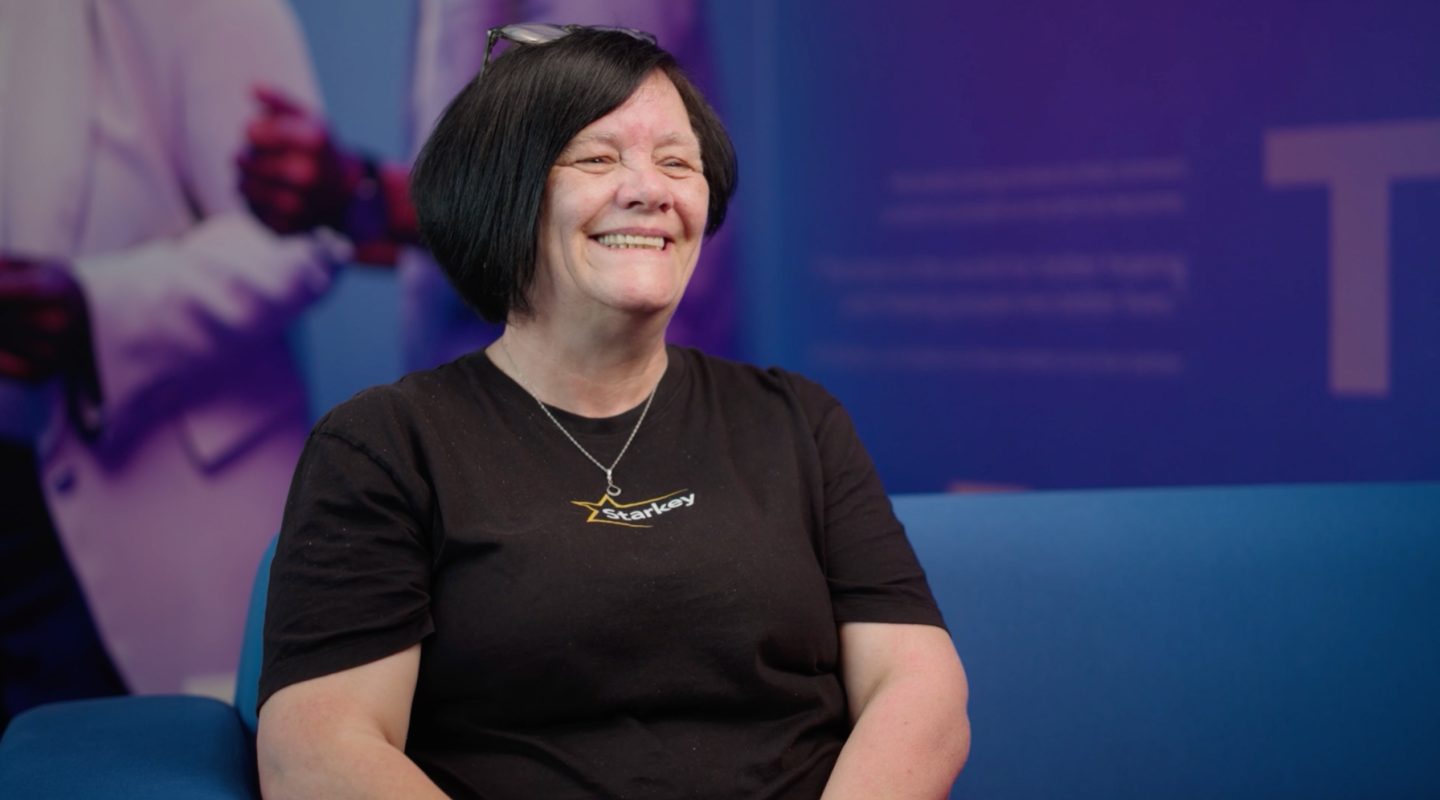 Woman with black hair sat down for Starkey interview